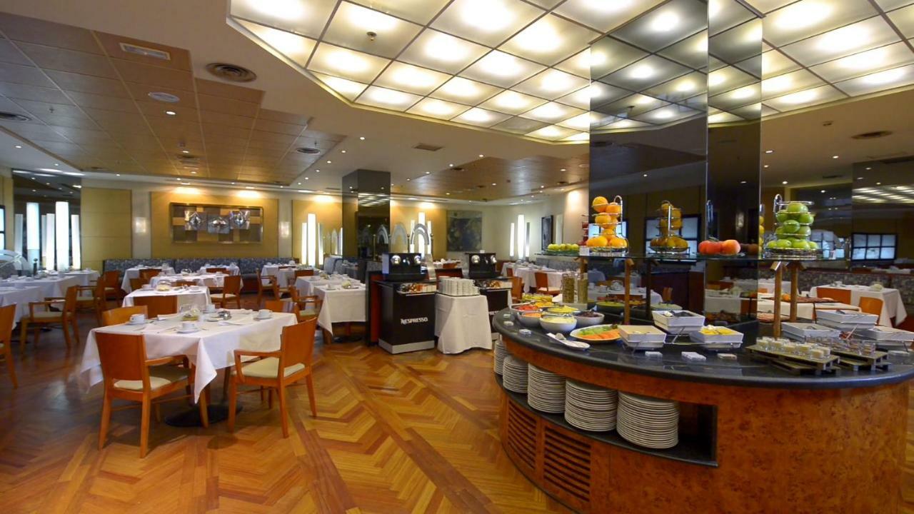 Hotel Miguel Angel Madrid Exterior foto The restaurant
